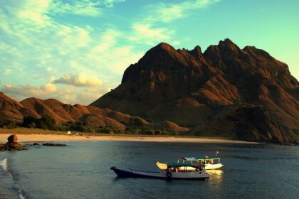 A picture of Komodo National Park, terrain rough and waters clear enough.