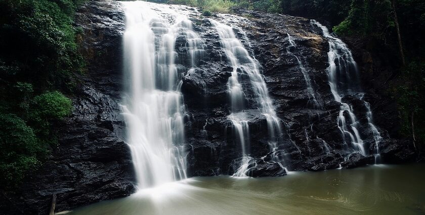 A serene view of Abbey Falls, one of the popular places to visit in Coorg, Karnataka.