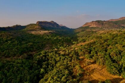 A bird’s eye view of the lush green vegetation and majestic peaks of the serene Khandala.