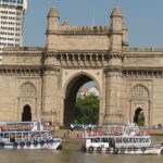 A view of the mighty Gateway of India with the Taj Hotel in Mumbai Central near places to visit in mumbai central