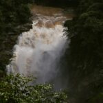 A view of Green landscape surrounding a sparkling waterfall at Sirsi Karnataka in India.