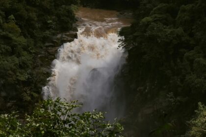 A view of Green landscape surrounding a sparkling waterfall at Sirsi Karnataka in India.