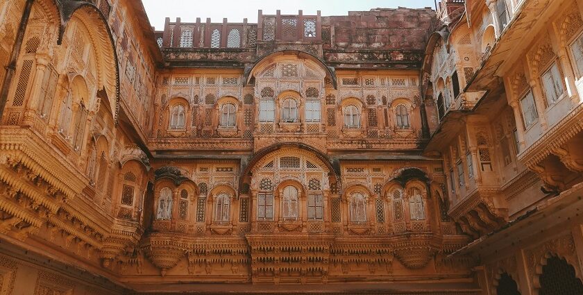 View inside the courtyard of Songiri fort, showcasing detailed architecture under a clear blue sky