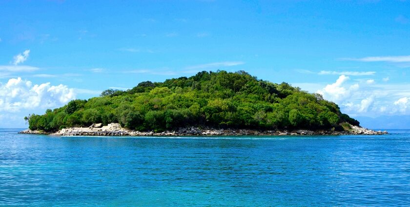 An image of Sulawesi Island's breathtaking coastline with turquoise waters and lush greenery.