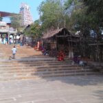 A temple in Tindivanam, showcasing its architectural design and surroundings.