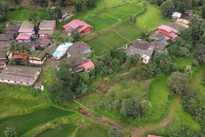 Lush greenery and cottages in Nature Village, Ratnagiri, Maharashtra.