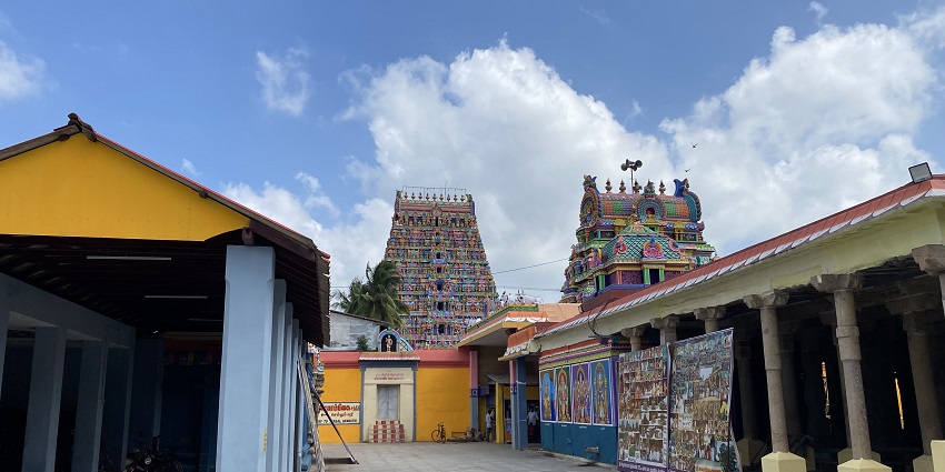Intricate stone carvings depicting various gods and stories in the Mayiladuthurai temple