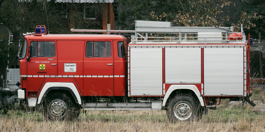 Historic firefighting equipment, including hoses and ladders, at Pune’s Fire Museum.