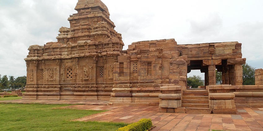 Explore the intricate carvings and architecture of the sacred Sangameshwar Temple.
