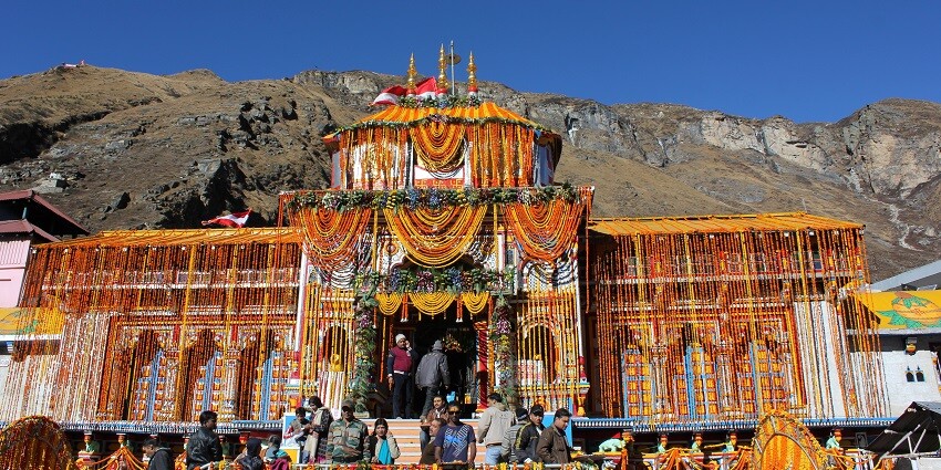 Shree Badrinath Temple stands tall against the backdrop of the majestic Himalayas.