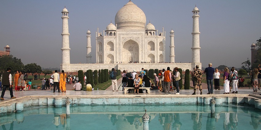 The majestic Taj mahal standing gorgeously amids the mughal garden in Agra