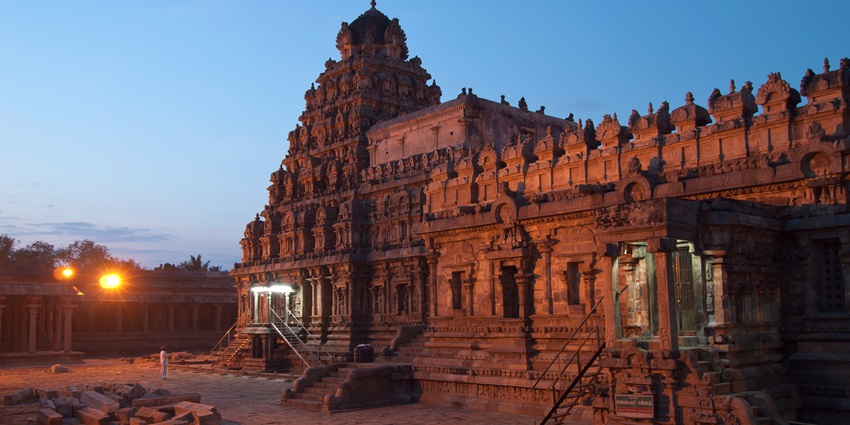 Airavatesvara Temple with detailed Dravidian architecture and intricate stone carvings