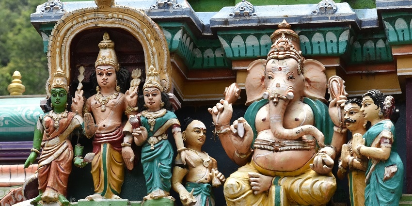 Intricate designs and sculptures of idols on the exteriors of the popular Alagar Kovil.
