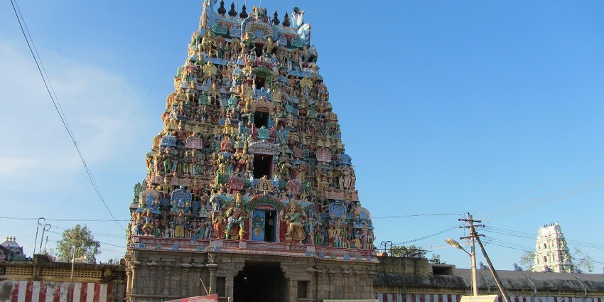 Alangudi Temple with its intricately carved stone architecture and vibrant sculptures
