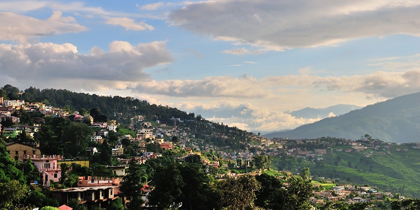 Image of a scenic view of Almora, capturing its hillside town charm and lush surroundings.