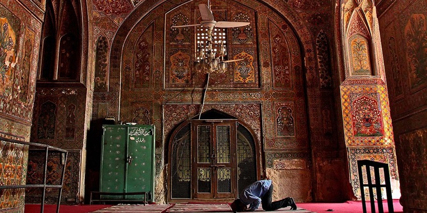 Anjuman-I-Islam Masjid in Mumbai, featuring a grand structure with intricate arches