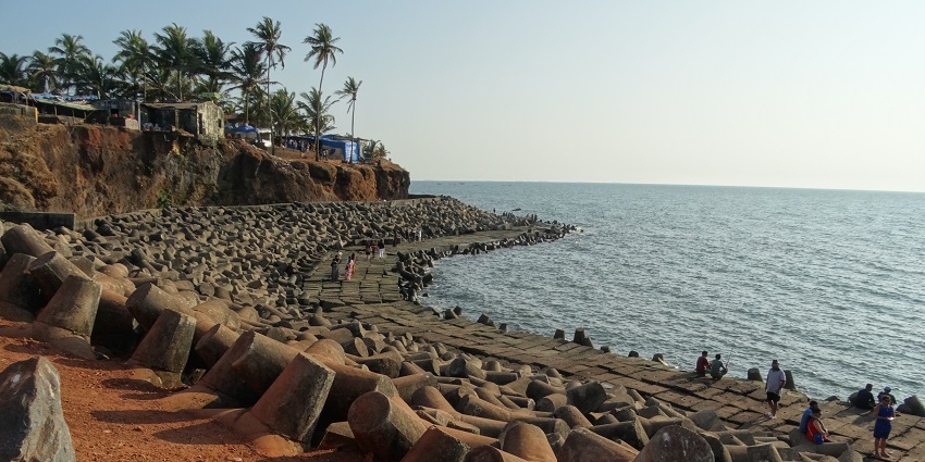 Anjuna Beach is a famous attraction with rocky terrains, perfect for family outings.