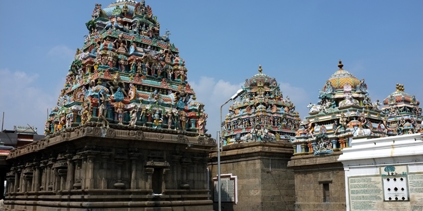 Kapaleeswarar Temple with colourful sculptures of deities carved into its gopurams