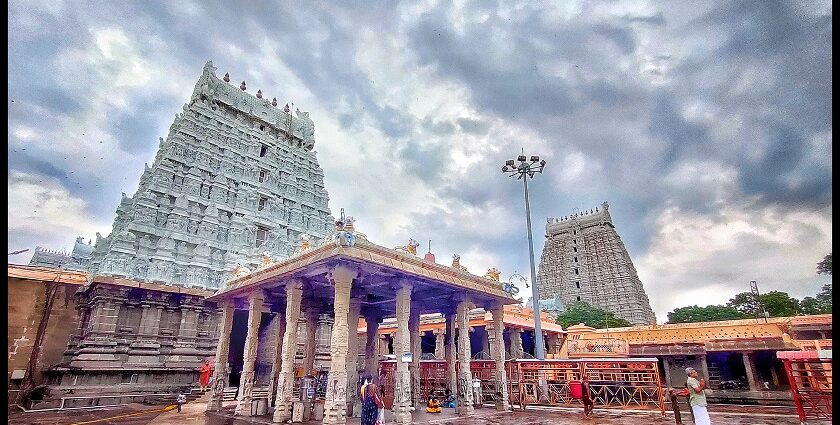 View of Arunachaleswara Temple showcasing towers and pillar structure and people worshipping