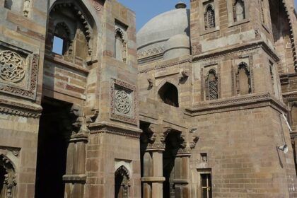 The Atala Mosque in Jaunpur showcases its intricate architecture and high walls.