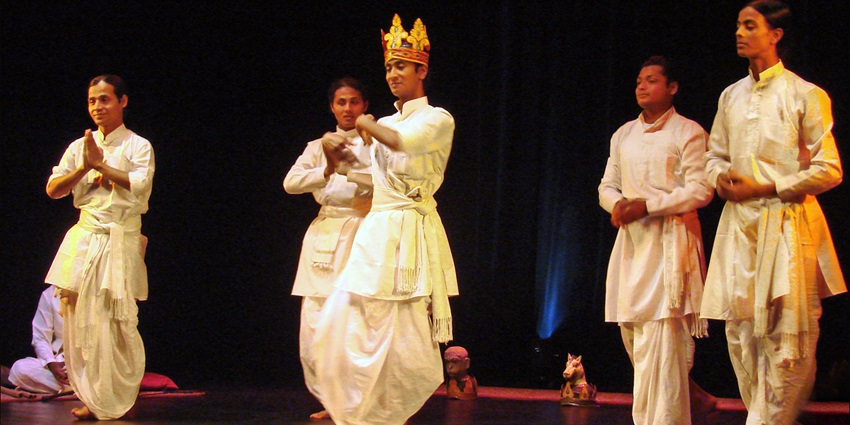 Celibate Sattriya monks of Majuli dancing in traditional attire during ritual