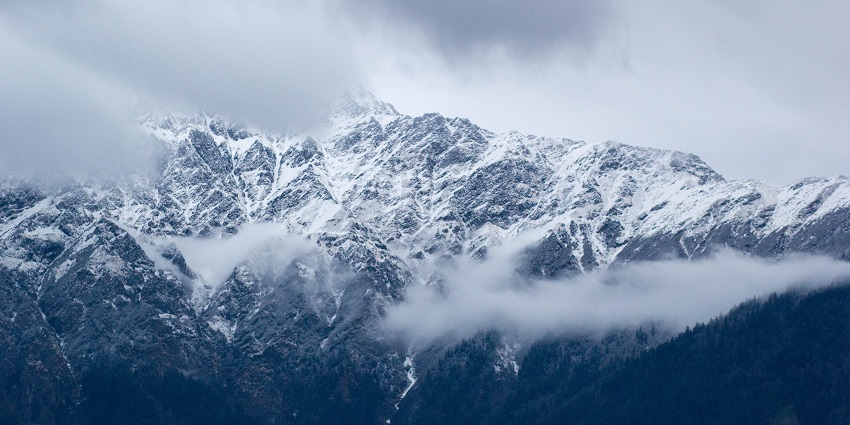 Picturesque view of Auli mountains covered in snow - beautiful view during day time