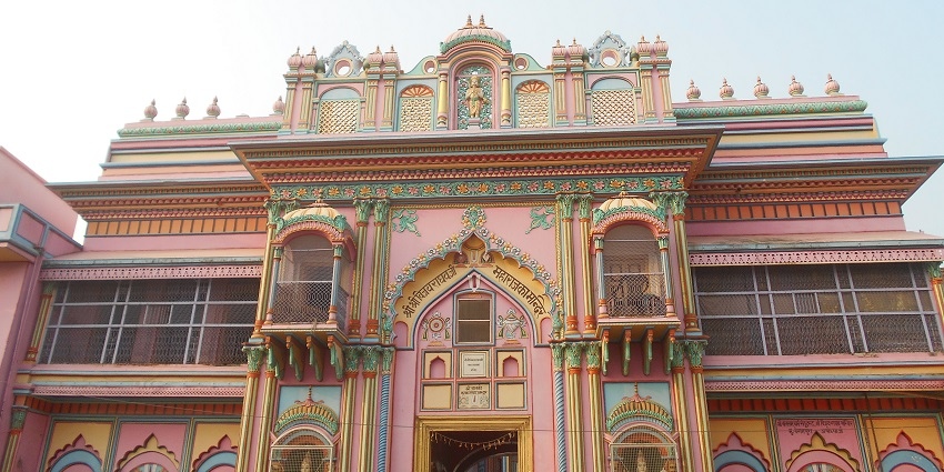 Scenic view of an Ayodhya temple surrounded by greenery and traditional architecture