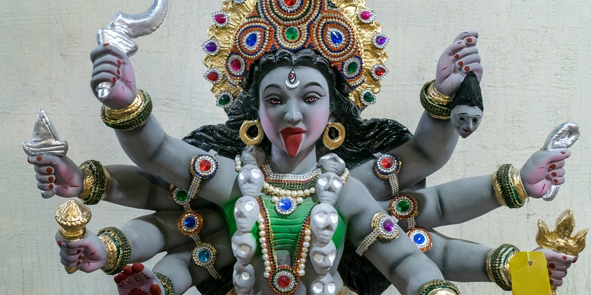 An image showing Badrakaliamman Temple with intricate carvings and colourful sculptures.