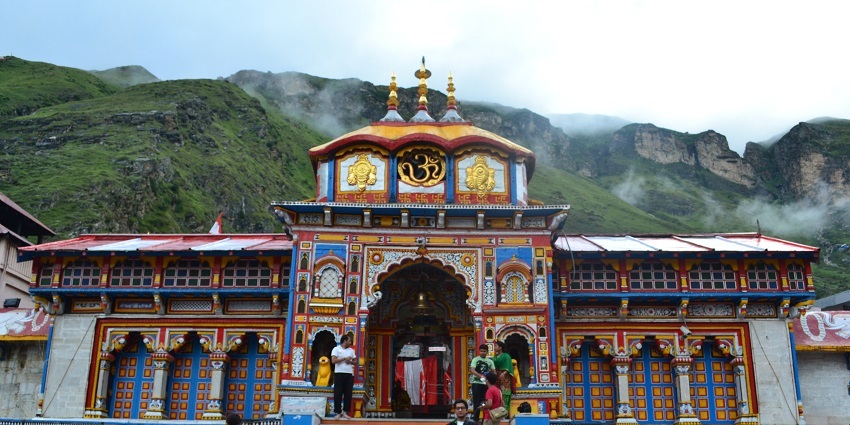 Badrinath temple is a famous religious place, surrounded by the high Himalayan peaks.