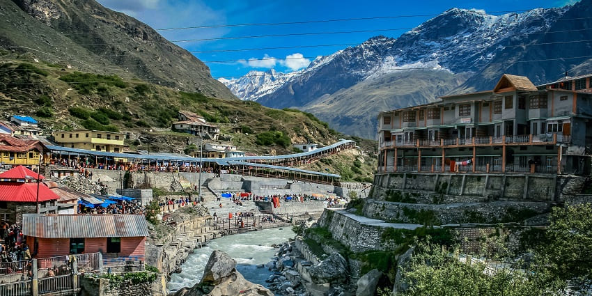 A mesmerising view of Badrinath, one of the top places to visit in Uttarakhand in July.
