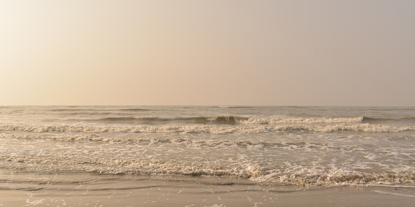 An image of the white sands bring relaxation at one of the places to visit in Bakkhali.