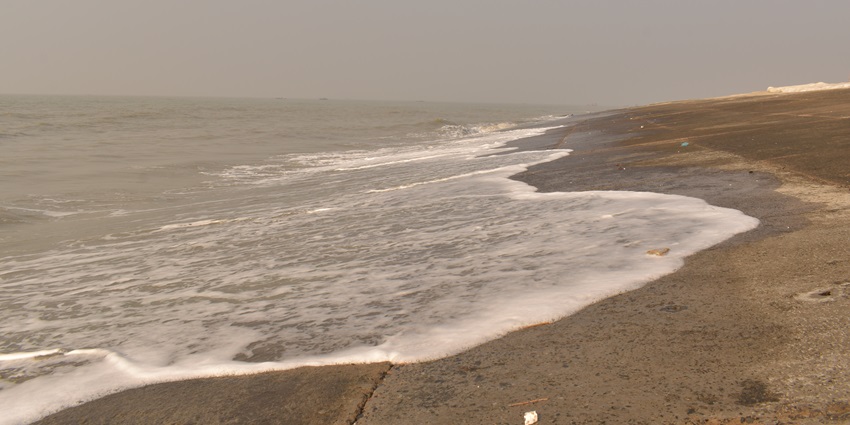 Sandy shores at Bakkhali Beach, offering a coastal escape
