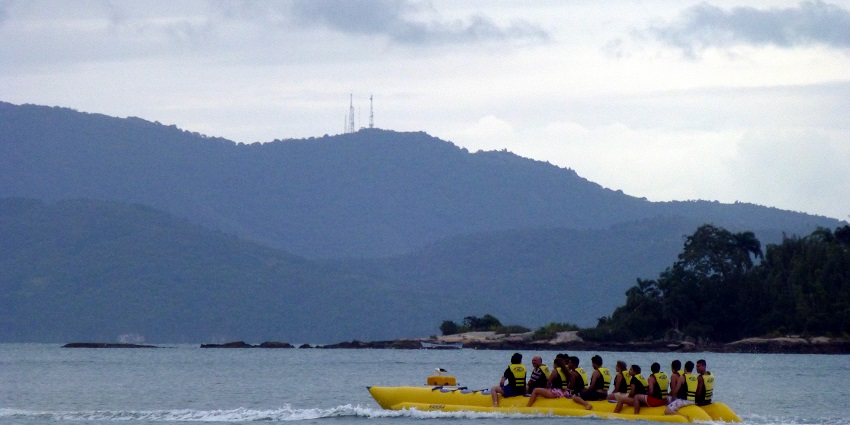 Fun group water ride on an inflatable banana boat at Holy island water sports