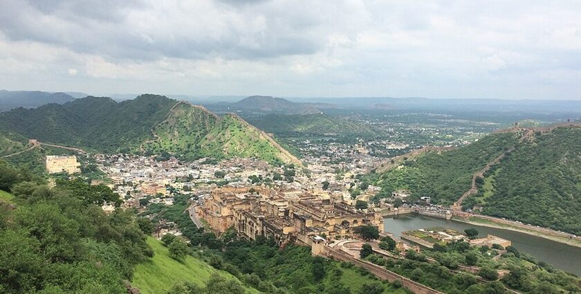 A serene view of Barua Sagar Fort, surrounded by lush greenery.