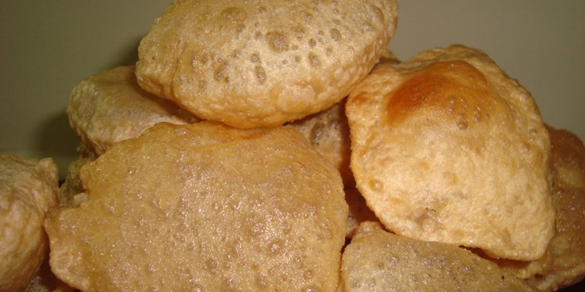 A plate of Bedhai, one of the best food in Vrindavan for travellers seeking authentic flavours.