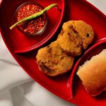 Egg Malpuas fried along with other food stalls on Mohammad Ali Road, Mumbai, on Ramzan