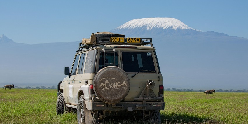 A picture of a jeep driving through the scenic landscapes of the reserve
