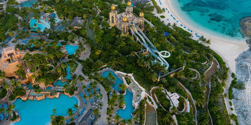 An image illustrating the bustling atmosphere at the water park during the summer season.
