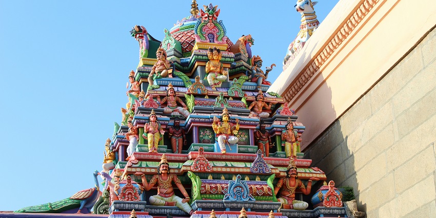 A breathtaking view of a temple in Tamil Nadu with amazing views during the daytime.