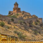 The majestic fortress perched on a rock, similar to the iconic Bhairavgad Fort in India.