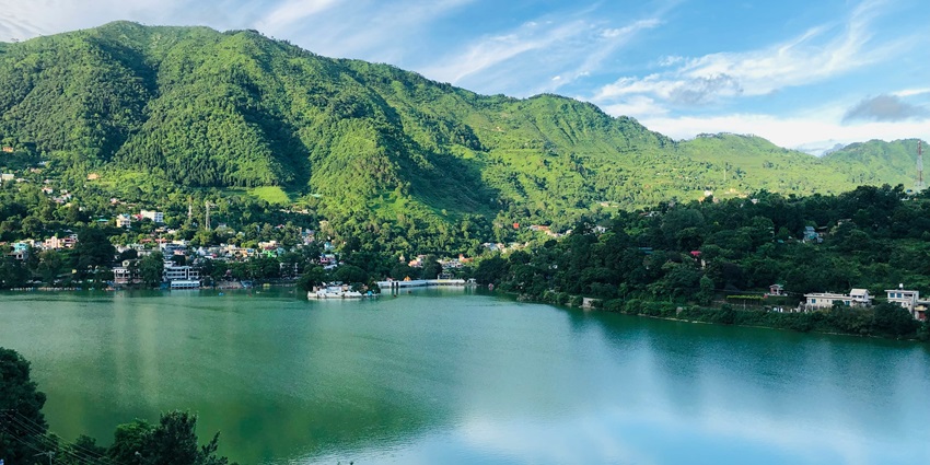 An image showing the serene Lake Bhimtal, one of the scenic places to see near Haldwani.
