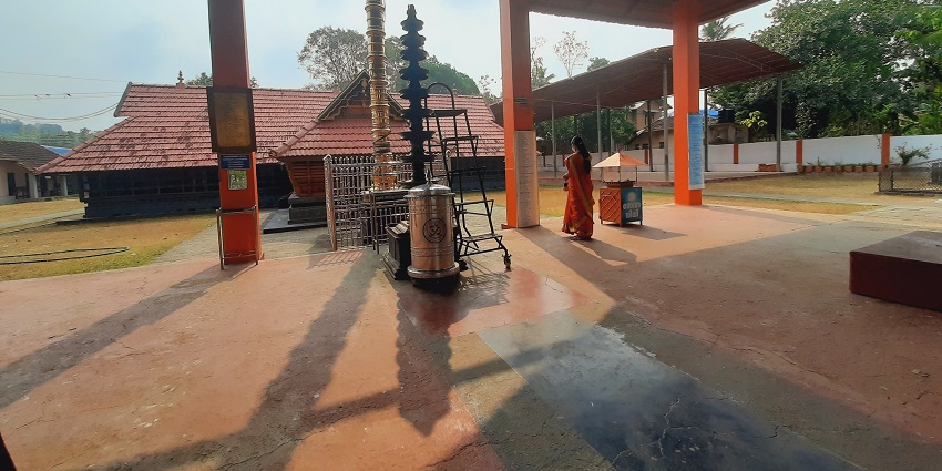 The beautiful red sandstone Bakkhali temple nestled at the end of the Bakkhali beach.