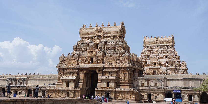 Brihadeeswarar Temple area with its towering vimana adorned with detailed carvings.