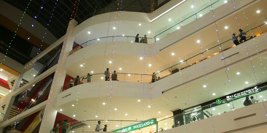Brookefields Mall with modern facade, bustling crowds and vibrant shops and eateries.