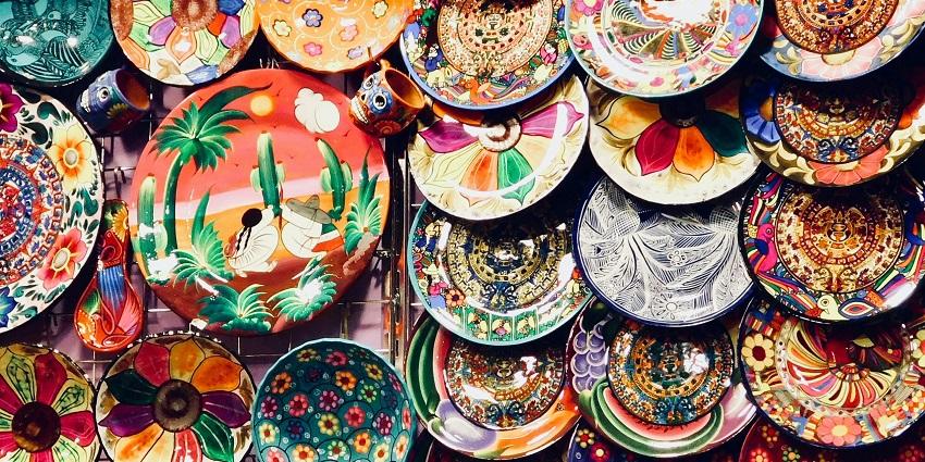 A picture of handcrafted pottery,with a alluring view.
