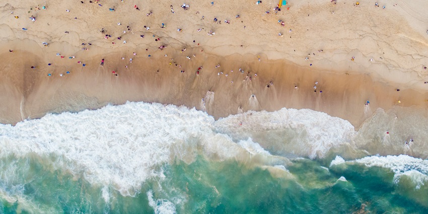 An aerial view of Calangute Beach, one of the serene places to visit in Goa in April.