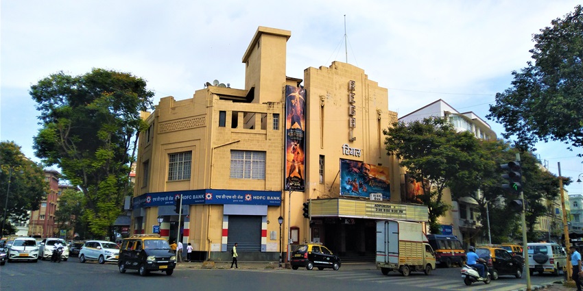 The exterior of Regal Cinema with its iconic art deco façade and retro movie banners, one of the best things to see in Colaba.