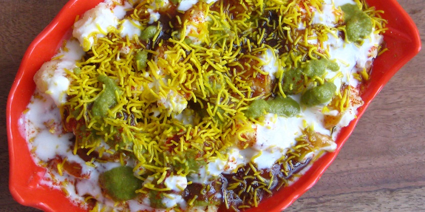 Chaat, one of the best dishes offers a flavour explosion and is garnished with sev.