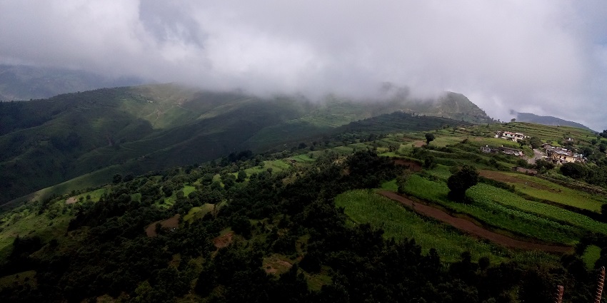 An image showing a view of Chakrata village, nestled in the scenic Himalayan landscape.