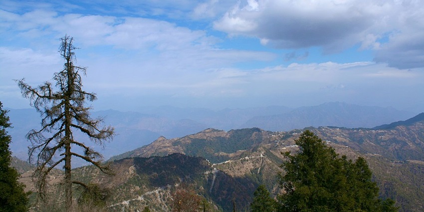 Places for the Pithoragarh trip include hills offering panoramic landscape views.
